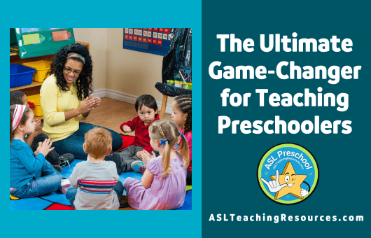 The Ultimate Game-Changer for Teaching Preschoolers. Image show preschool classroom with teacher and students sitting in circle practicing sign language.